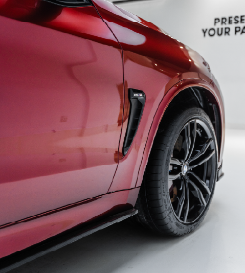 PPF Paint Protection Film – Premium Protection for BMW X5 M Red BMW X5 M protected by premium PPF Paint Protection Film for a sleek, scratch-free finish.