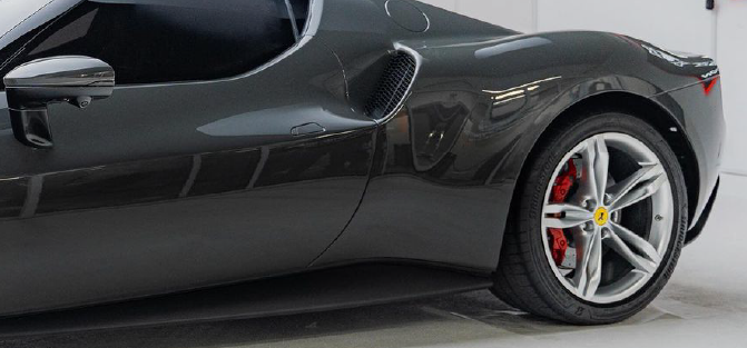Body Kit Installation for Ferrari – Sleek Design and Precision Fitment Ferrari sports car with custom body kit installation highlighting sleek side design and performance wheels